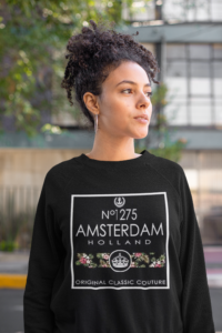 heathered-sweatshirt-mockup-of-a-curly-haired-woman-posing-on-the-street-23972a